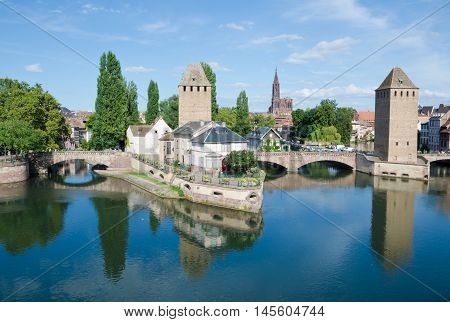 STRASBOURG, France. 29th August 2016. A view of the covered bridges, one of the beautiful city's of Strasbourg's historic tourist attractions.