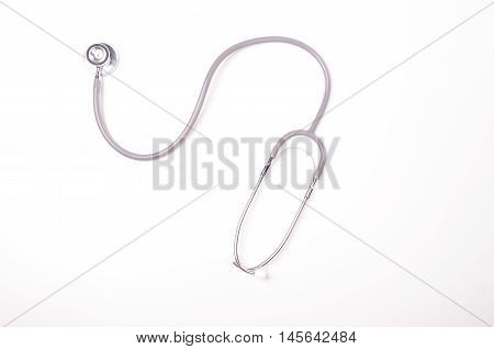 Grey stethscope isolated on white background with lighting