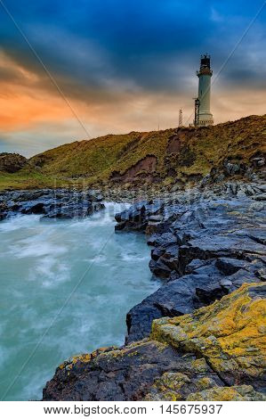 Girdle Ness lighthouse During Sunrise in Aberdeen Scotland UK