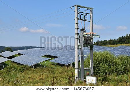 Solar powerplant and electricity pylons. Solar powerplant.
