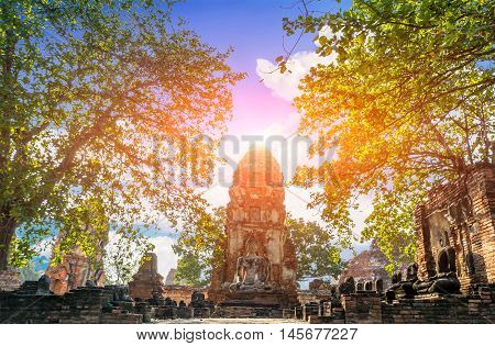 buddha statue in ayutaya temple Thailand  and flare