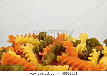 Three color pasta detail. Pasta tri-colored spiral.