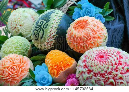 Fresh carved pumpkins and melons decorated by Thai carver