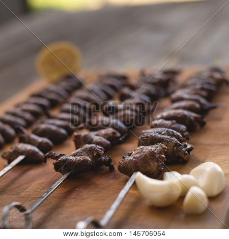 Churrasco, Traditional Brazilian Barbecue, Chicken Hearts Grilled Kebabs.