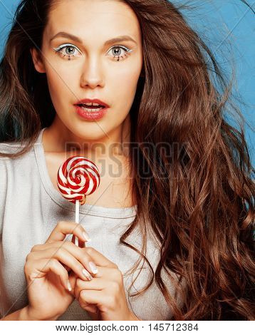 young pretty adorable woman with candy close up like doll makeup