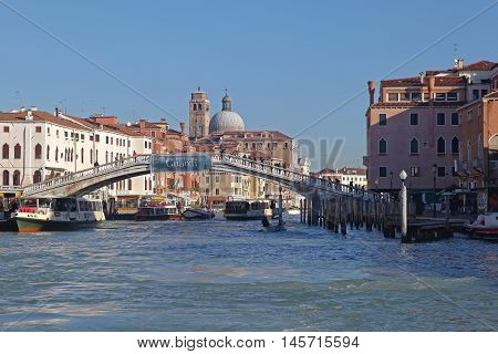 VENICE ITALY - DECEMBER 19: Bridge Over Grand Canal in Venice on DECEMBER 19 2012. Ponte degli Scalzi Near Train Station in Venice Italy.