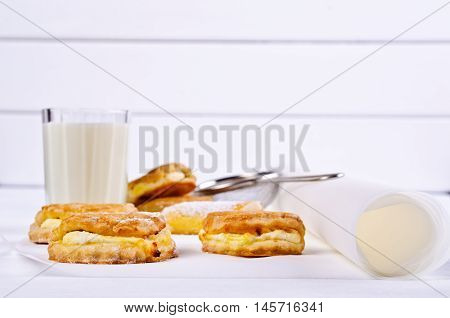 Homemade buns stuffed with cottage cheese on a wooden background. Selective focus.