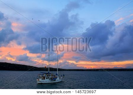 Sailboat In Great Darwin Bay At Sunrise, Genovesa Island, Galapagos National Park, Ecuador