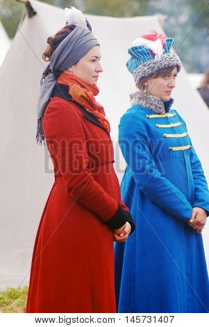 BORODINO MOSCOW REGION - SEPTEMBER 04 2016: Reenactors women at Borodino battle historical reenactment in Russia. Color photo.