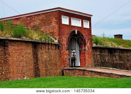 Baltimore Maryland - July 24 2013: U. S. Park Ranger stands at the sally port entrance to Fort McHenry National Historic Park