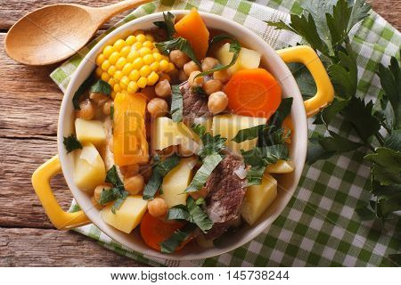 South American Cuisine: Thick Soup Pouchero Close-up In A Pot. Horizontal Top View