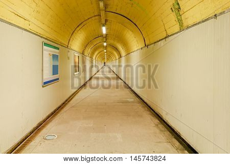 A long tunnel crossing under the hill to the train station in Manarola. Parco Nazionale delle Cinque Terre, Liguria, Italy.