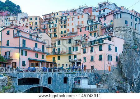 A view of the colorful traditional houses on the rock. The coast of Liguria. Manarola, Cinque Terre.