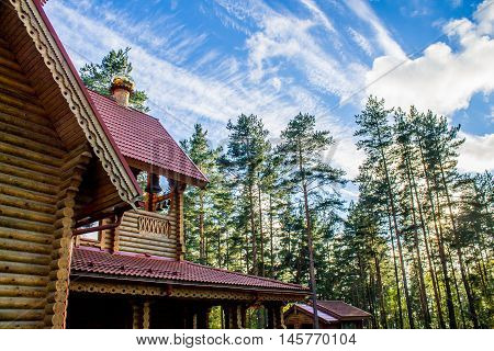 Wooden Orthodox church in Russia at forest