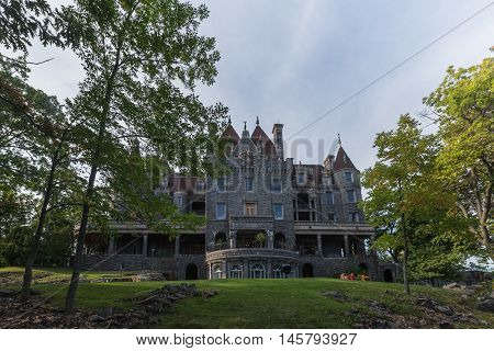 Boldt Castle surrounded by trees in the summer time