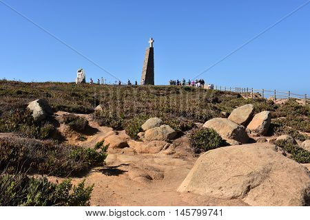 SINTRA, PORTUGAL - AUG 20: Monument declaring Cabo da Roca as the westernmost extent of continental Europe, as seen at Roca Cape near, Sintra, Portugal, on Aug 20, 2016.
