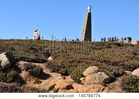 SINTRA, PORTUGAL - AUG 20: Monument declaring Cabo da Roca as the westernmost extent of continental Europe, as seen at Roca Cape near, Sintra, Portugal, on Aug 20, 2016.