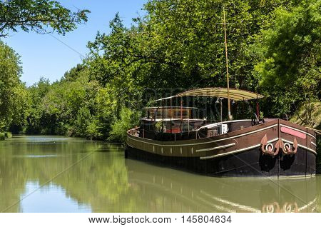 A beautiful barge on midi canal near Carcassonne in France