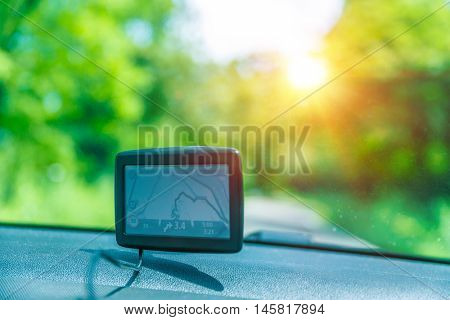 GPS navigator in the car, good help for travelers to find a necessary road, modern technology, electronic maps
