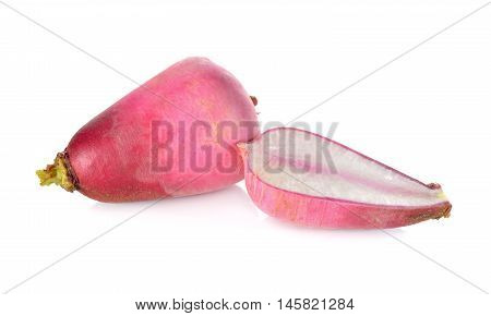 uncooked whole and half cut sweet radish on white background