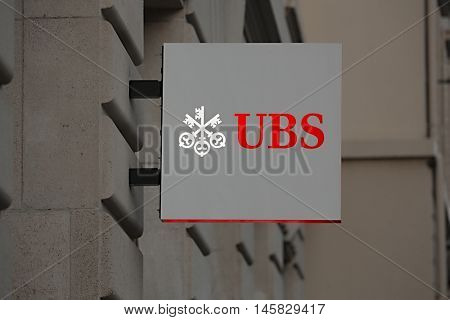 BASEL, SWITZERLAND - JULY 06, 2016: Sign of UBS bank on building facade. UBS is considered the world's largest manager of private wealth assets.