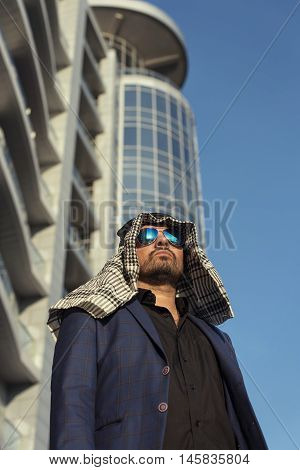 Oriental young businessman in the modern city