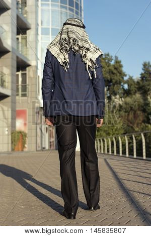 Oriental young businessman in the modern city