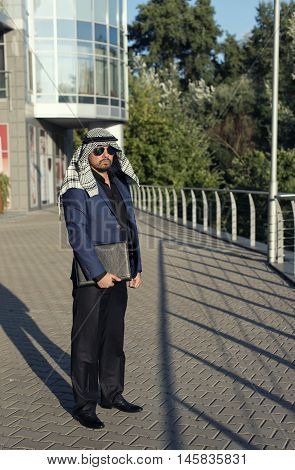 Oriental young businessman in the modern city