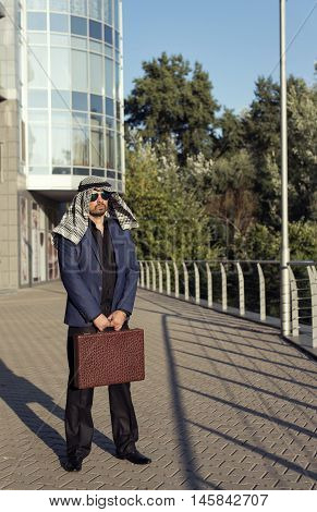 Oriental young businessman in the modern city
