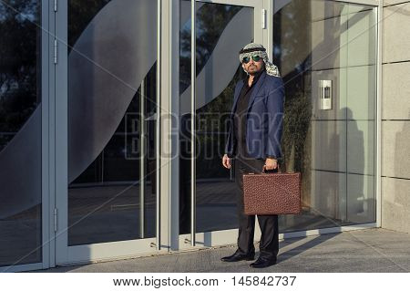 Oriental young businessman in the modern city