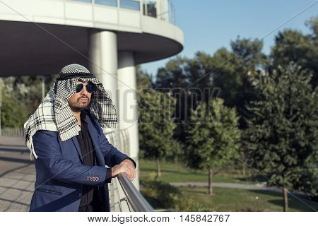 Oriental young businessman in the modern city