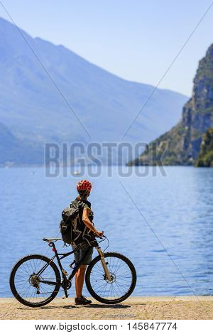 Mountain biking on Lake Garda, Riva del Garda, Italy. Amazing view of Lake Garda.