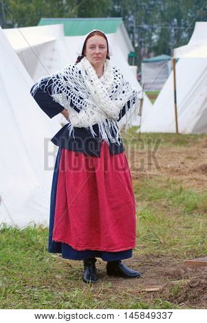BORODINO MOSCOW REGION - SEPTEMBER 04 2016: Reenactor woman portrait at Borodino battle historical reenactment in Russia. Color photo.