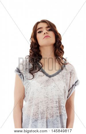 Young unhappy woman with long dark hair.