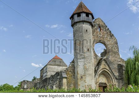 Ruins of medieval cistercian abbey in Transylvania, founded in 1202.Fromnt view.