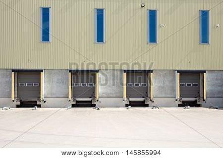Row of loading and unloading docks at a transport company.
