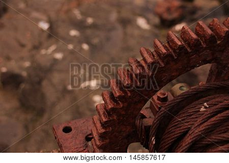 Rusted iron wheal at the coastline in the Faroe Islands
