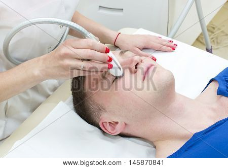 male is in the process at the clinic lipomassage