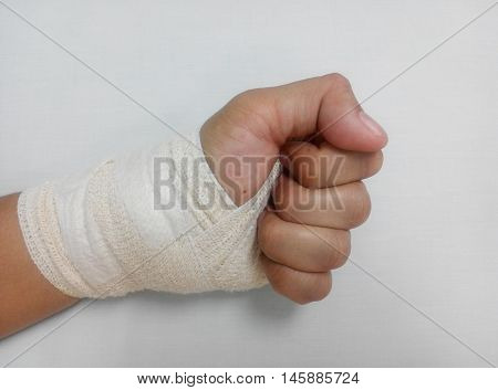 MALACCA, MALAYSIA -MARCH 09, 2016: Left wrist injury and wrap with bandage