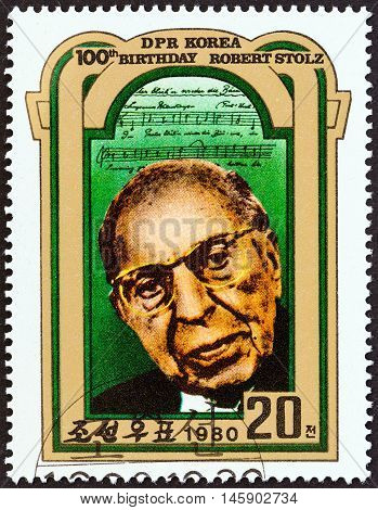 NORTH KOREA - CIRCA 1980: A stamp printed in North Korea issued for the 100th birth anniversary of Robert Stoltz shows conductor Robert Stoltz, circa 1980.