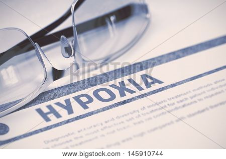 Hypoxia - Printed Diagnosis with Blurred Text on Blue Background with Pair of Spectacles. Medicine Concept. 3D Rendering.