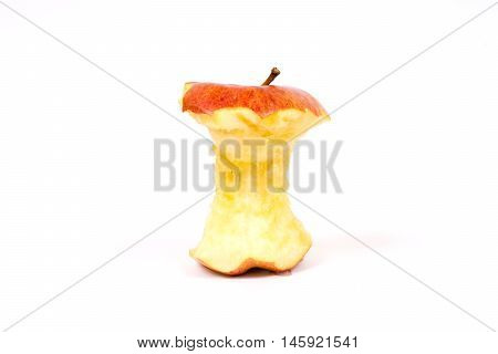 Red apple core on a white background