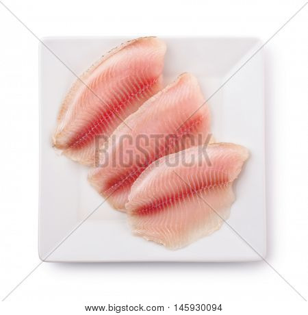 Top view of  plate with raw fish fillet isolated on white