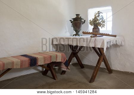 Taman, Russia - March 8, 2016: View On The Bench - Bed In The Cottage In A Museum In Memory Of The G