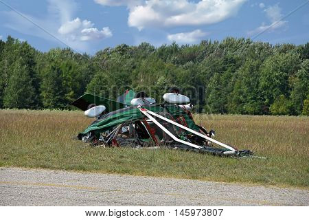 Ultralight crash on field next to airport runway