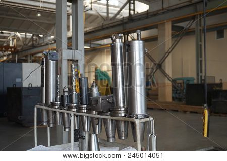 Rack For Mandrels With Cutters Near The Cnc Machine