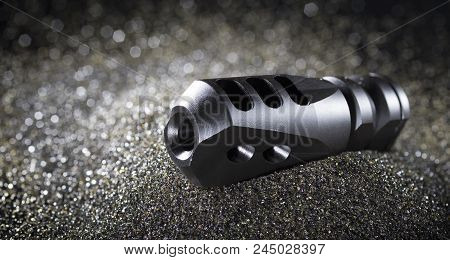 Black Compensator For An Ar-15 On Dark Sandblasting Media