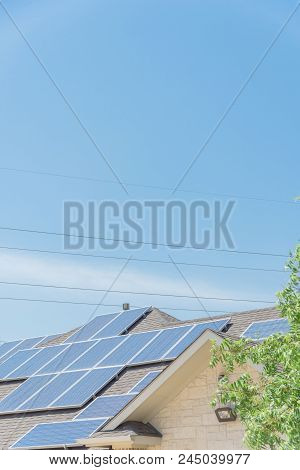 Solar Panel Installation On Asphalt Shingles Rooftop