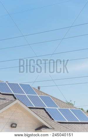 Solar Panel Installation On Asphalt Shingles Rooftop