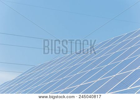 Solar Panel Installation On Asphalt Shingles Rooftop